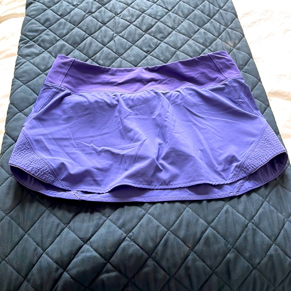Lululemon size 10 skort!    Perfect for golf or tennis.